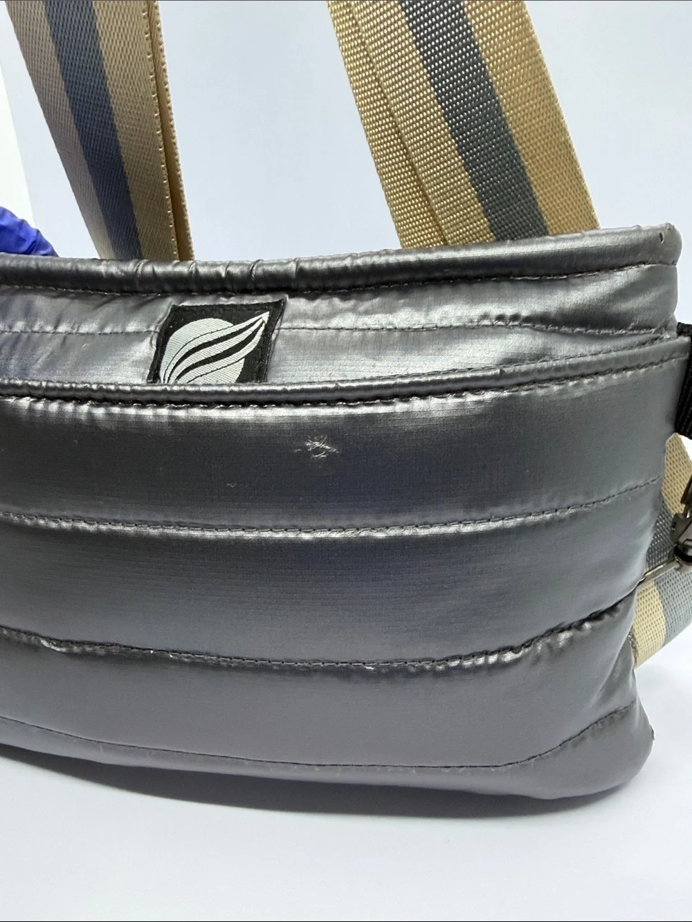 THINK ROYLN Gray Quilted Messenger Bag with Striped Tan Strap